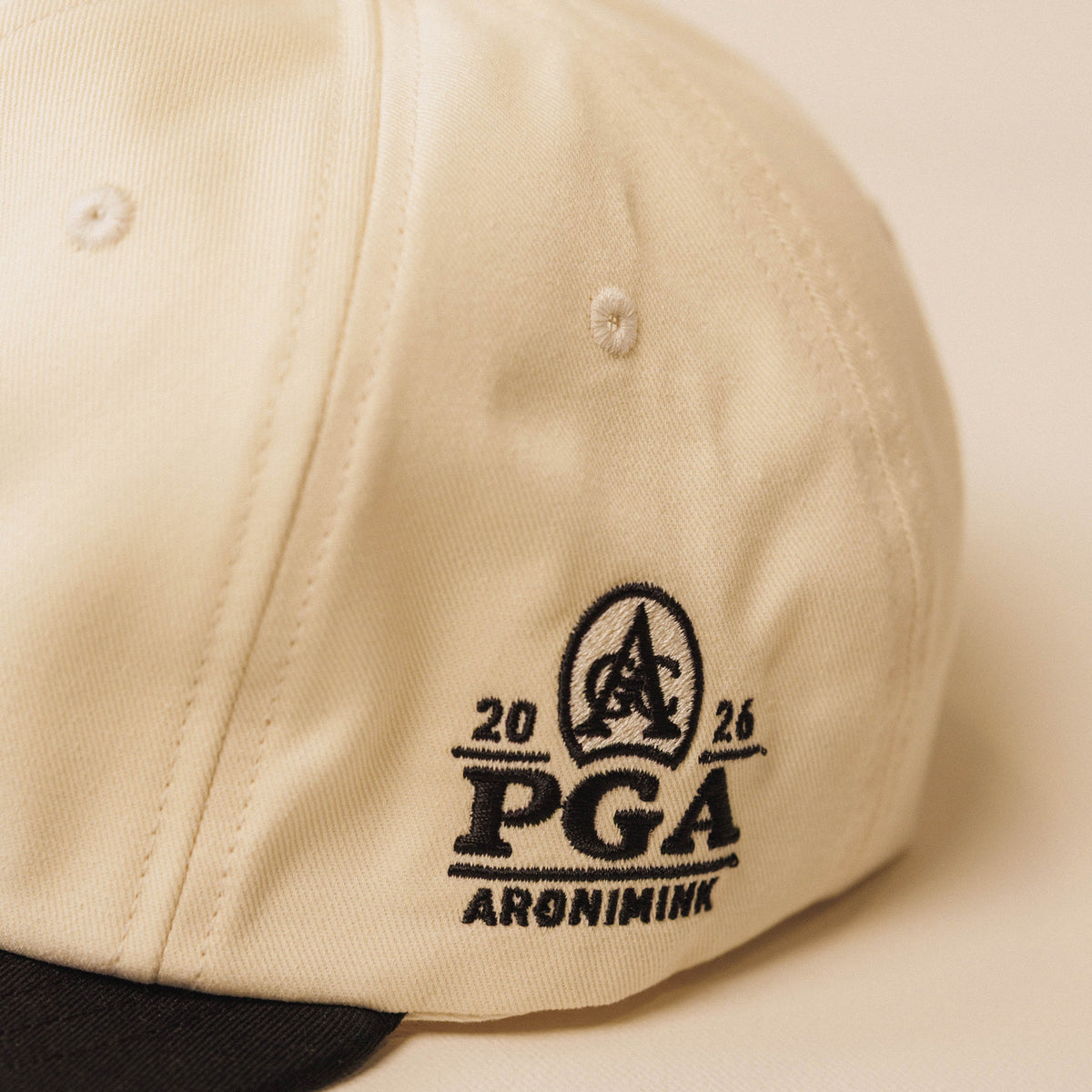 Underdog 2026 PGA Championship Two Tone Hat in Khaki and Black - PGA Logo Detail